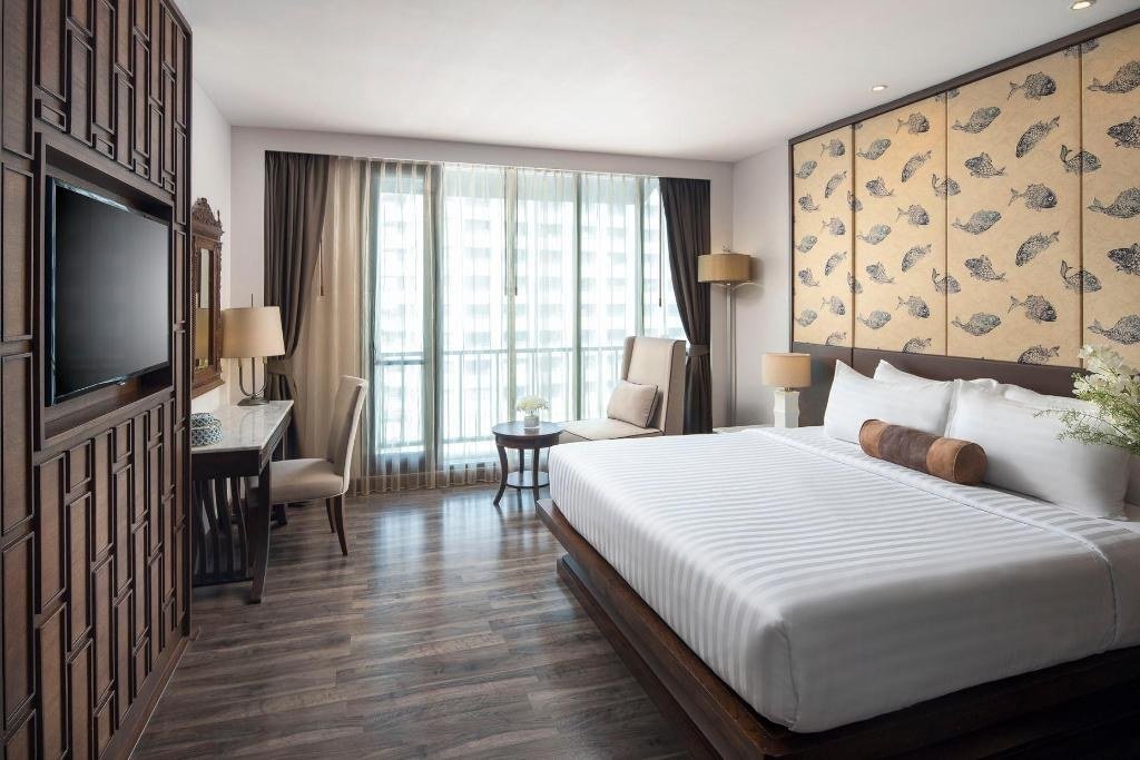 Guest bedroom and balcony at Casa Nithra Bangkok