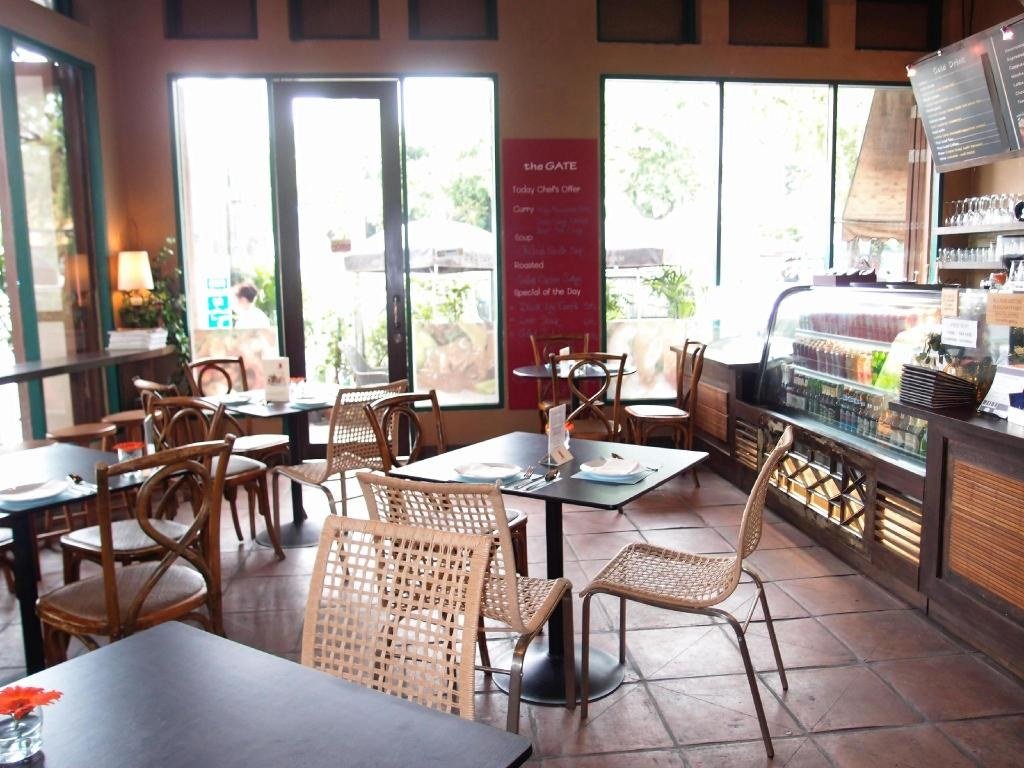 Restaurant tables beside windows at Chetuphon Gate