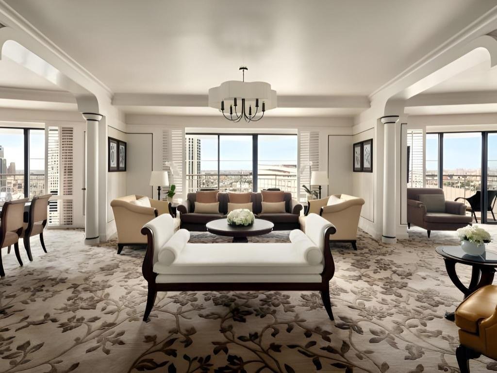 Guest bedroom and sitting area at Shangri-La Bangkok