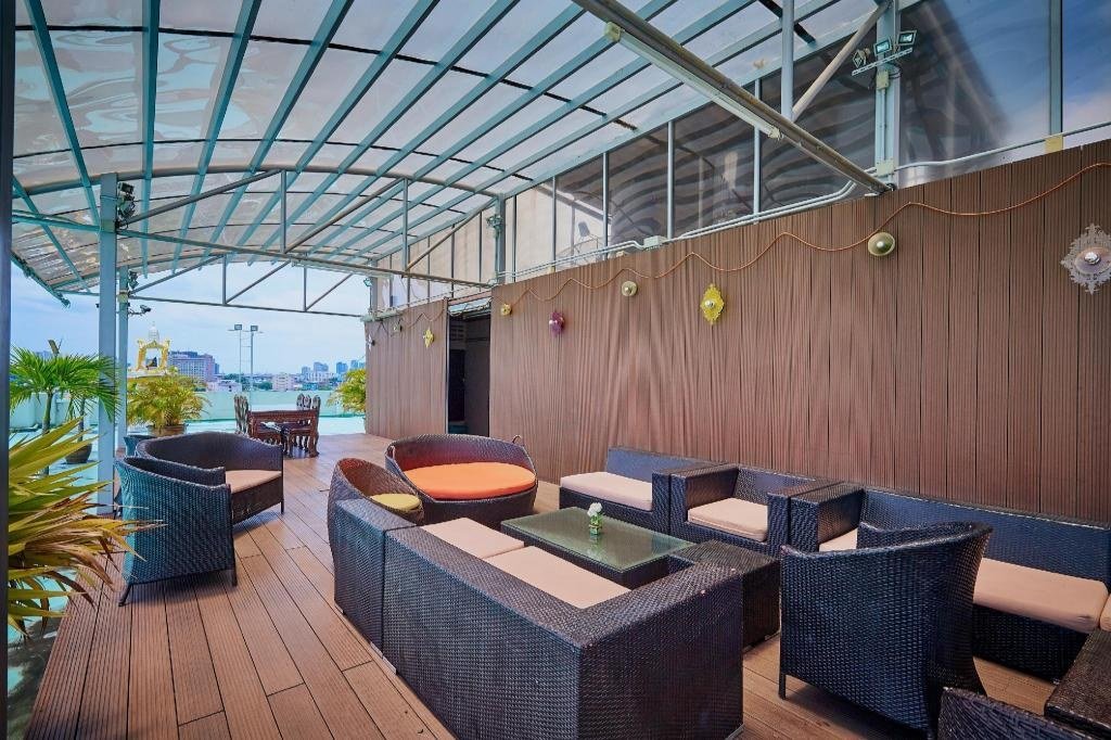 Glazed lounge and seating at Sivalai Place Bangkok