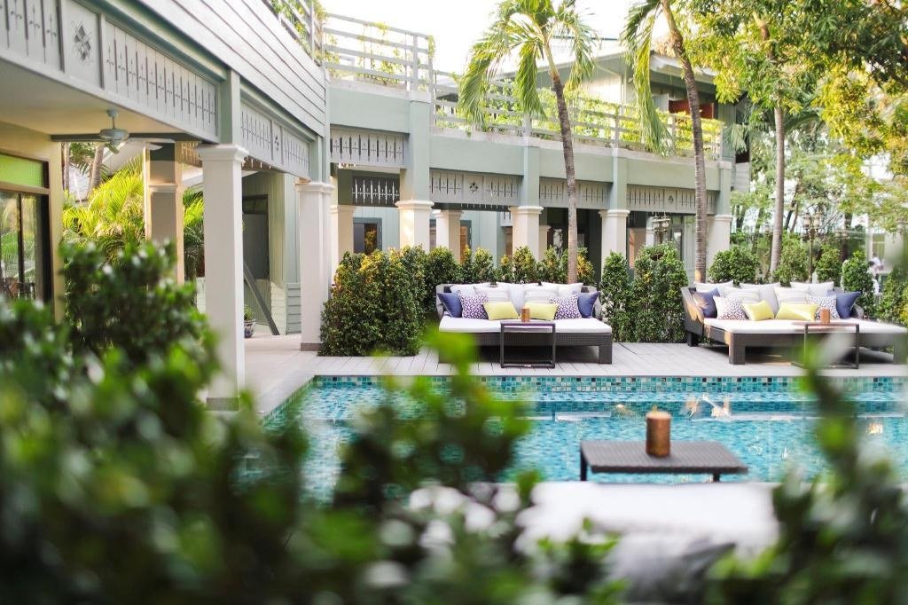 Garden courtyard and swimming pool at The Raweekanlaya Bangkok Wellness Cuisine Resort