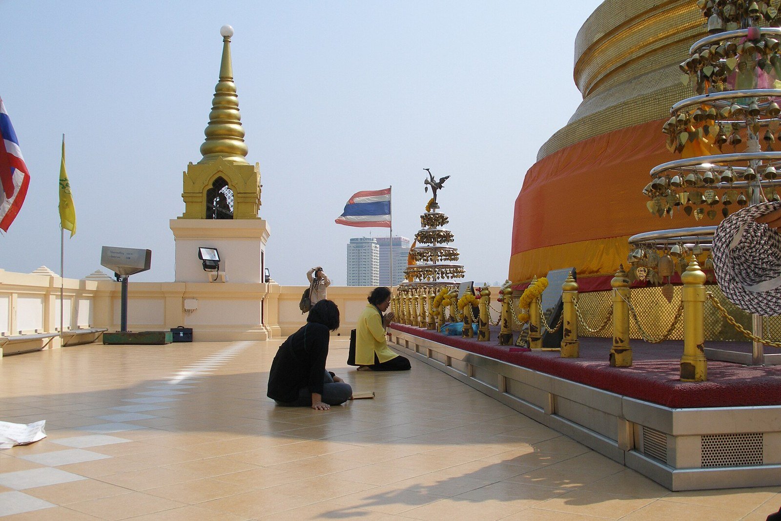 Visitors beside the Golden Mount stupa at Wat Saket